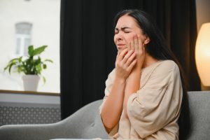 woman with mouth pain